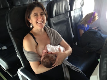 Jenny True breastfeeding wearing a baby wrap (and only a baby wrap) 