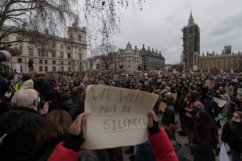 LONDON, UNITED KINGDOM - MARCH 14, 2021: Protesters gather in Parliament Square to demonstrate again...