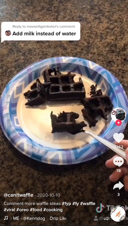 A man makes some chocolate Oreo waffles for TikTok. 