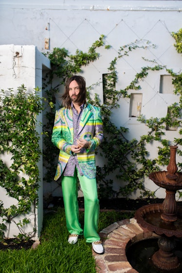 Kevin Parker in a Versace green suit