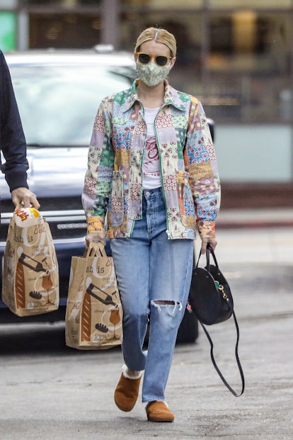 Emma Roberts wears a stylish quilted coat as she returns home from a day of  shopping in LA