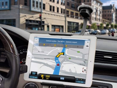 A white tablet on a tablet car mount