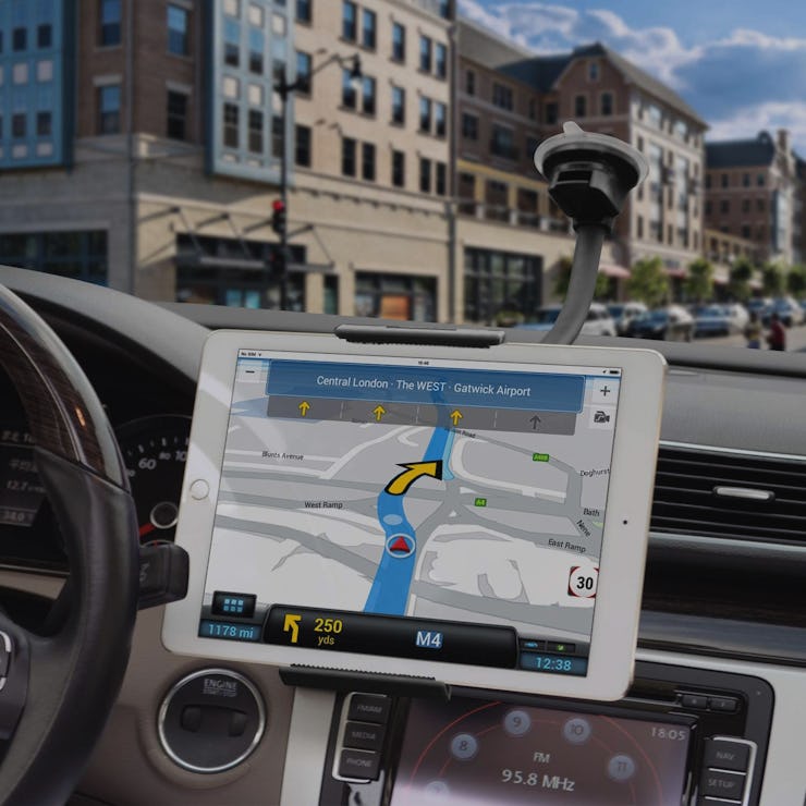 A white tablet on a tablet car mount
