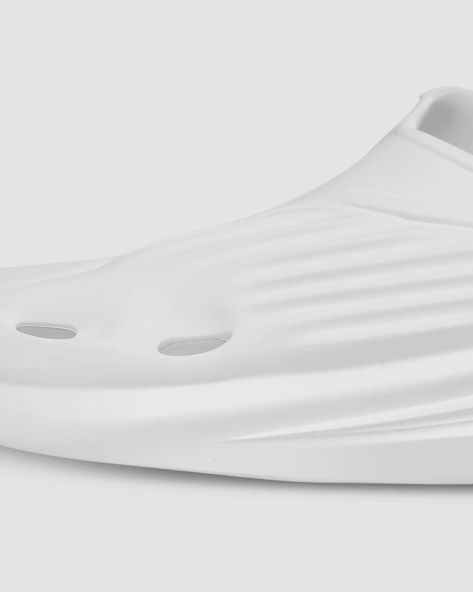 Love Kanye's weird Yeezy Foam Runner shoes? Then these clogs are for you. Love Kanye's weird Yeezy Foam Runner shoes? Then these clogs are for you.