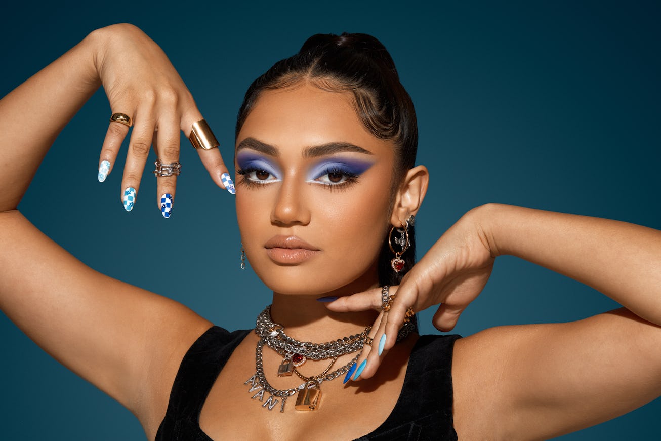 Avani poses with blue eyeshadow from Morphe collection