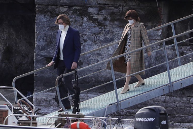 Adam Driver and Lady Gaga walking down a ramp