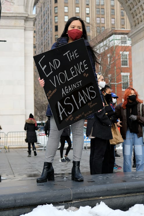 woman at a protest in Washington Square Park 