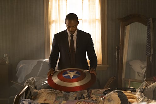 Sam Wilson considers Captain America's shield in 'The Falcon & The Winter Soldier.' Photo via Disney