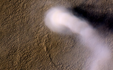 A dust devil towering 12 miles high above the Martian surface.