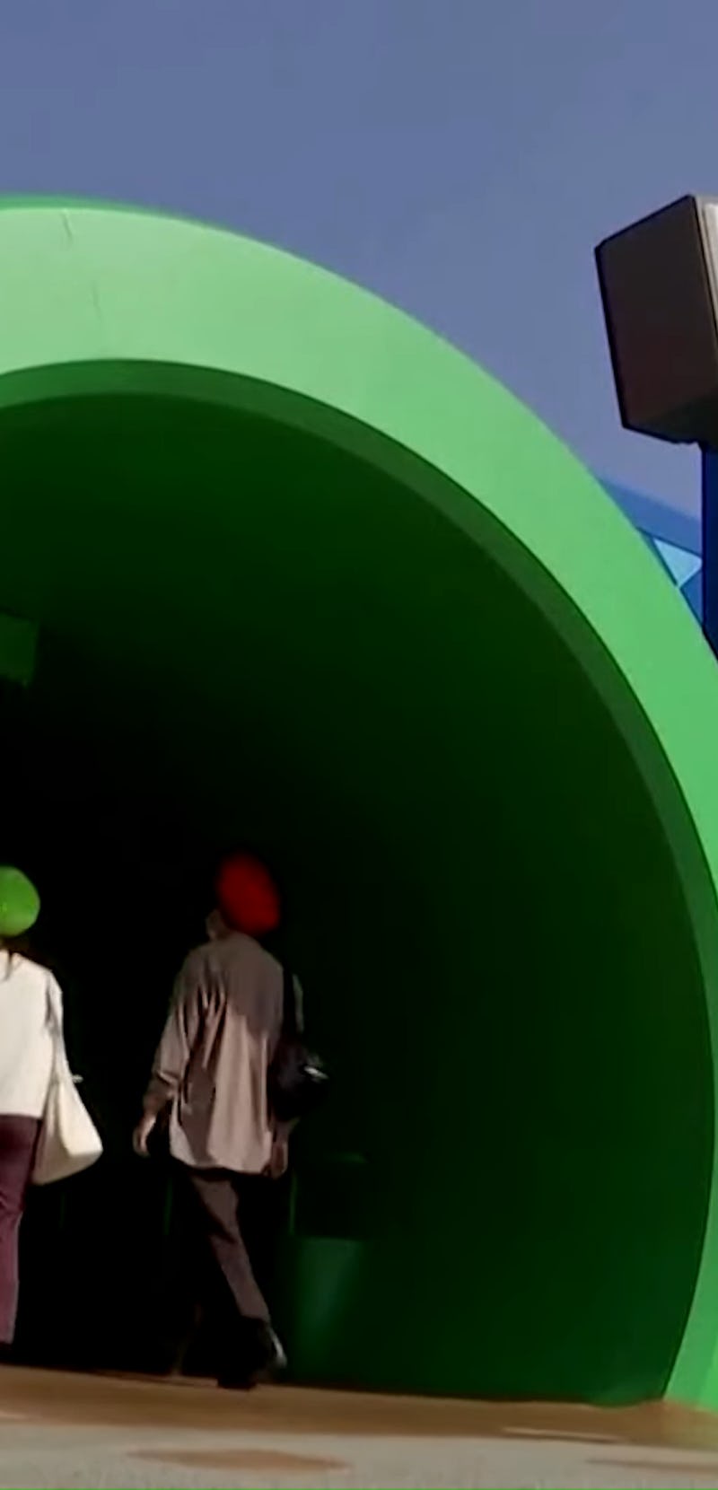 Two people enter a warp pipe