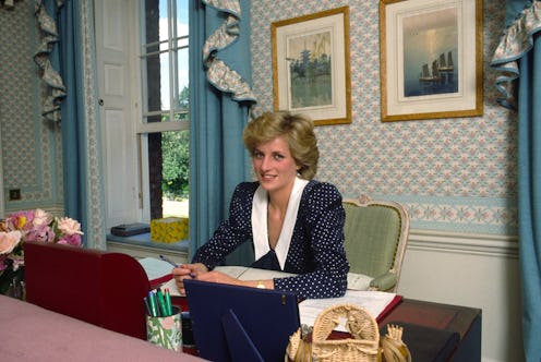 Princess Diana at her desk, writing letters