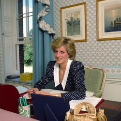 Princess Diana at her desk, writing letters