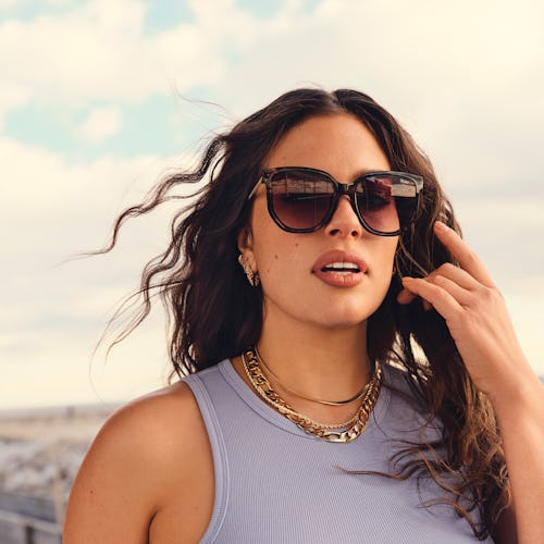 Ashley Graham wearing a pair of sunglasses from the Ashley Graham X Quay collaboration.X Quay