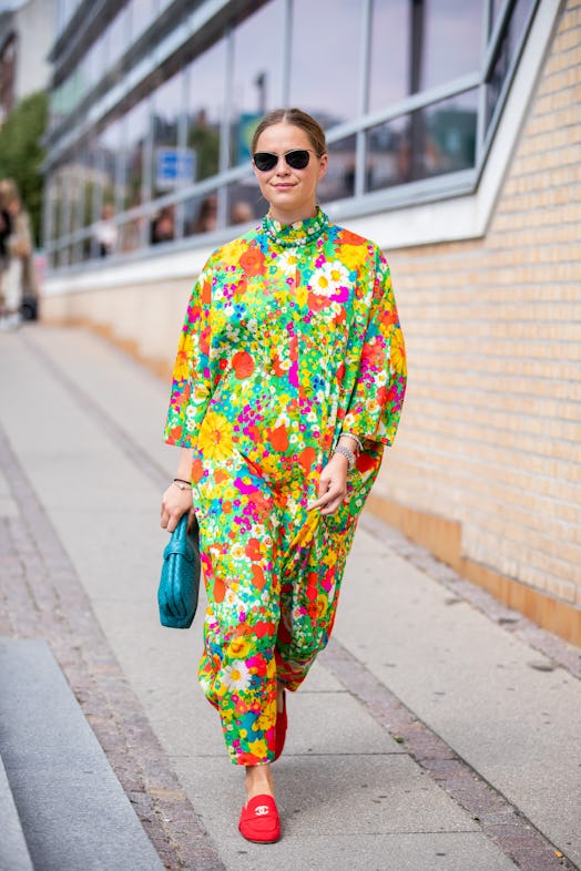 A guest is seen outside Holzweiler during Copenhagen Fashion Week Spring/Summer 2020 on August 07, 2...