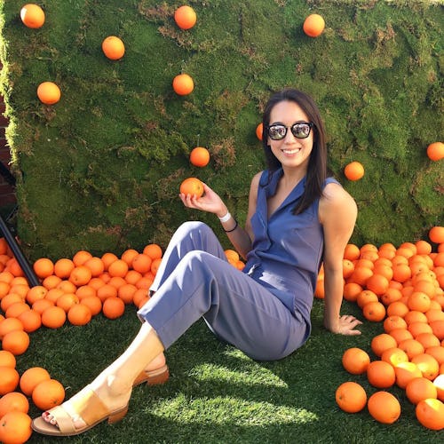 Marina Liao wearing a blue jumpsuit.