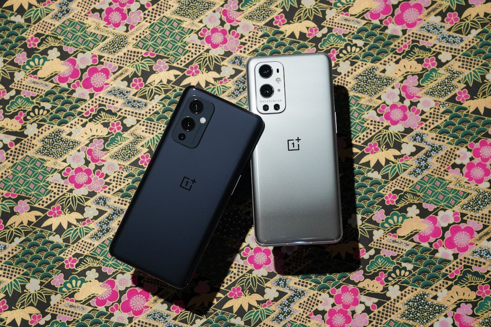 The OnePlus 9 (left) has a fiberglass frame, glass back, and three cameras. The OnePlus 9 Pro (right...