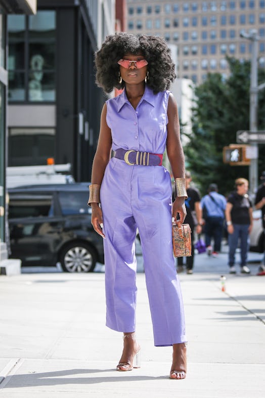 A guest is seen wearing a purple romper during New York Fashion Week on September 09, 2019 in New Yo...