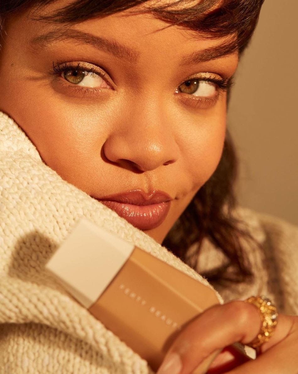Fenty Beauty Eaze Drop Blurring Skin Tint on Rihanna.