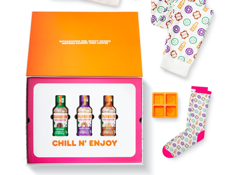 Dunkin's Girl Scout Cookie-inspired bottled ice coffees and merch pay tribute to the iconic treats.