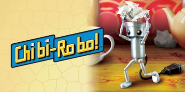 The small Chibi Robo! robot walking through a messy room and carrying a piece of paper over his head