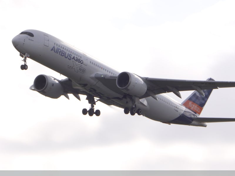 An Airbus A350-900 takes off with 100% SAF on board