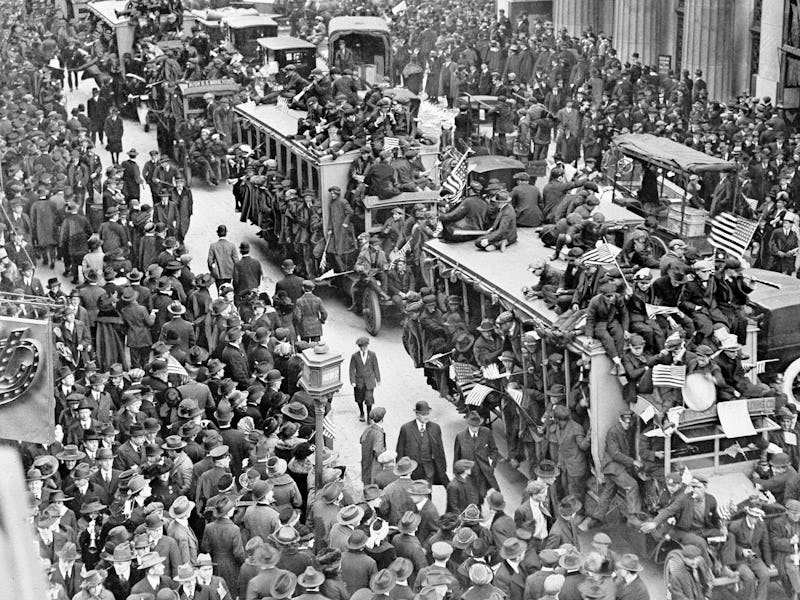 Armistice Day celebrations on Nov. 11, 1918, worried public health experts as people crowded togethe...