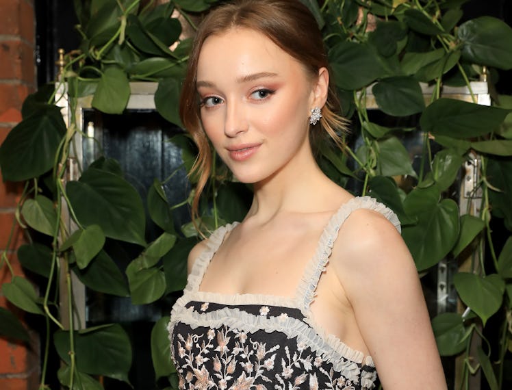 Phoebe Dynevor posing for a photo