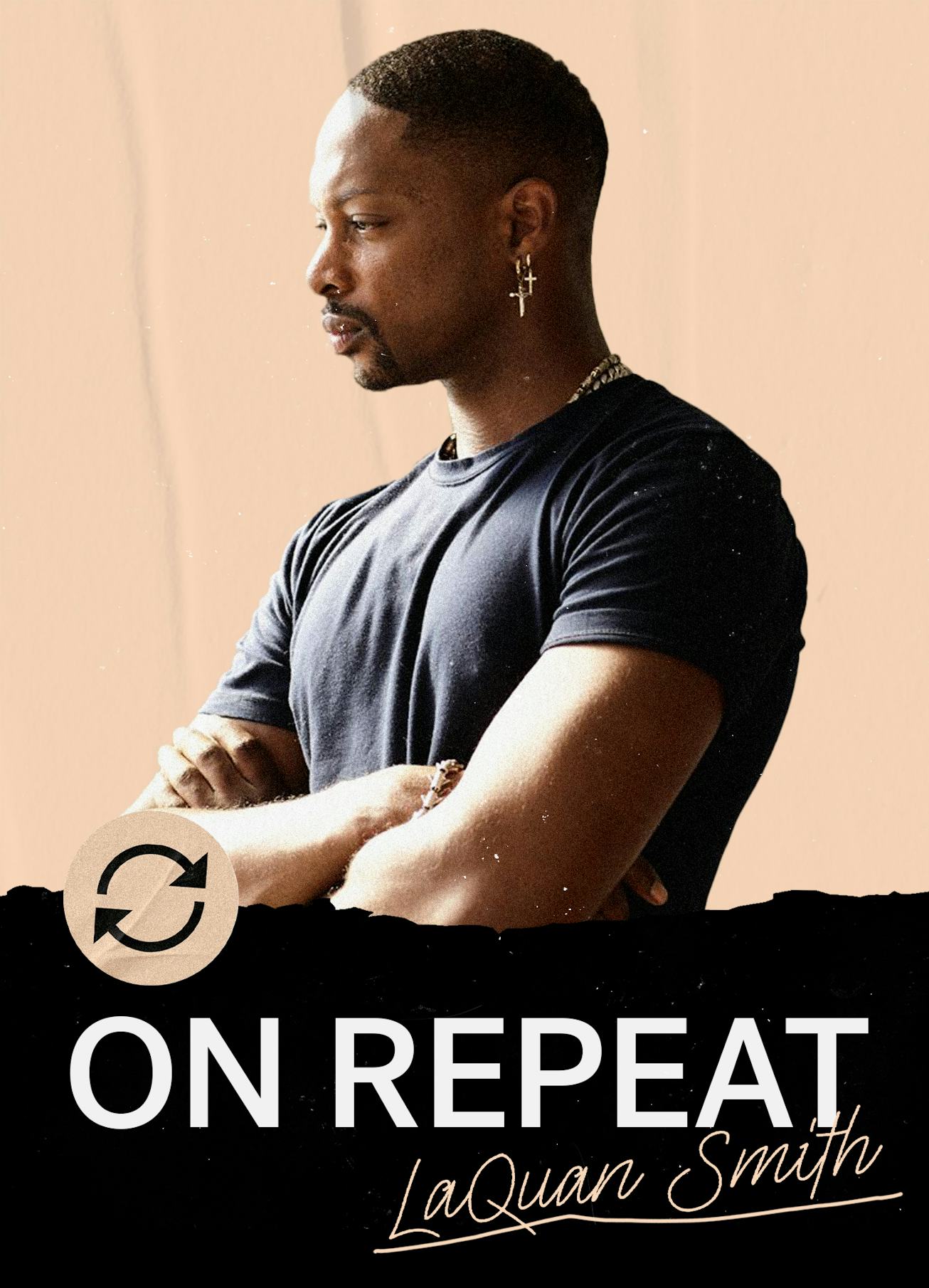 LaQuan Smith in a black T-shirt posing for a cover of NYLON’s “On Repeat”, sharing his favorite play...