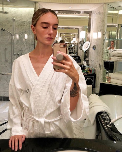 Hannah Baxter taking a selfie after her botox and filler injections treatment