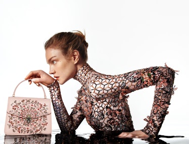 Natalia Vodianova with bejeweled Serpenti bag