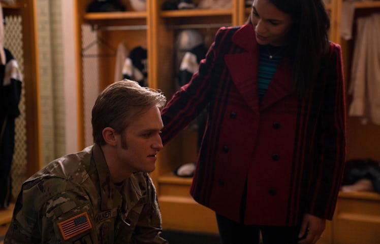 Wyatt Russell as John Walker and Gabrielle Byndloss as Olivia Walker in The Falcon and the Winter So...