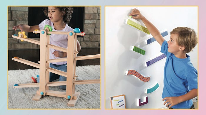 Two children playing with the best marble runs