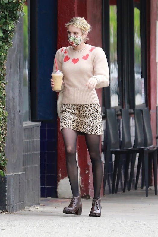 Emma Roberts steps out for a Frappuccino in Aritzia x Wilfred heart-embroidered sweater on May 12, 2...