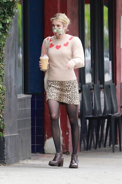 Emma Roberts steps out for a Frappuccino in Aritzia x Wilfred heart-embroidered sweater on May 12, 2...
