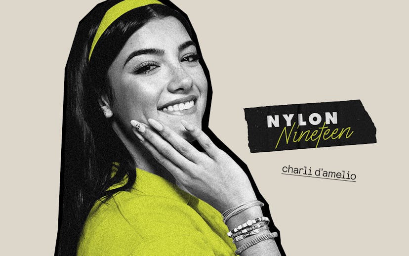 Charli D'Amelio in a yellow monochrome photo smiling at the camera