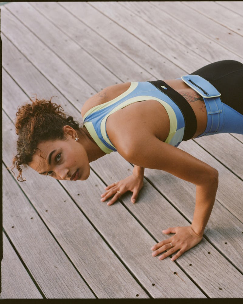 Model Jessica Strother wearing leggings and sports bra from Solid & Striped Sport collection, now av...