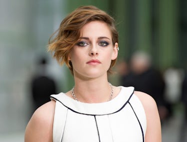 A portrait of Kristen Stewart in a white-black dress