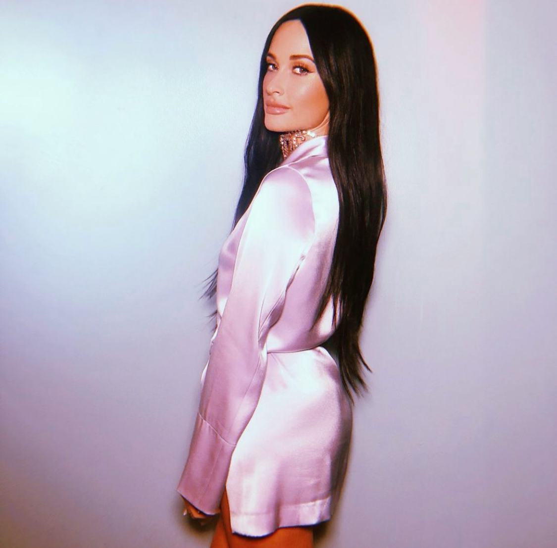 Kacey Musgraves Debuted Blunt Bangs With A Side Of Bright Green Eyeshadow