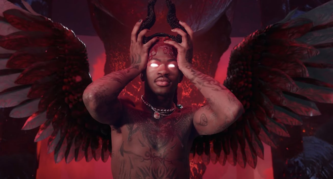 Lil Nas X ascends the throne of hell in his new "Montero (Call Me By Your Name)" video.