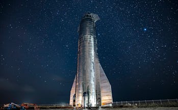 The Starship rocket over the backdrop of the night sky