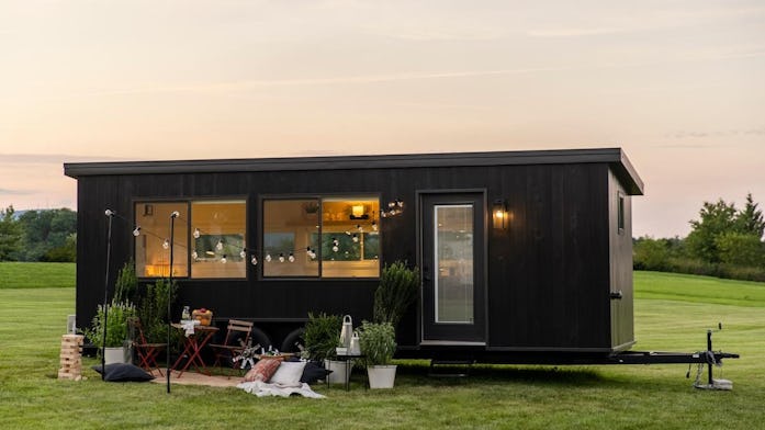 The exterior for Ikea's tiny house can be seen on a yard.