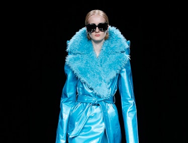 Balenciaga fur-trimmed blue coat.