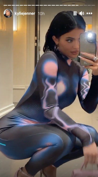 Kylie Jenner poses for a mirror selfie with her natural hair