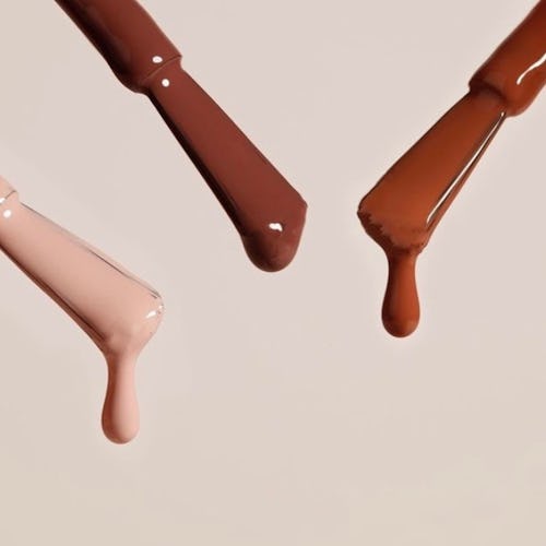 Three nail polish wands in different shades of the best nude nail polishes