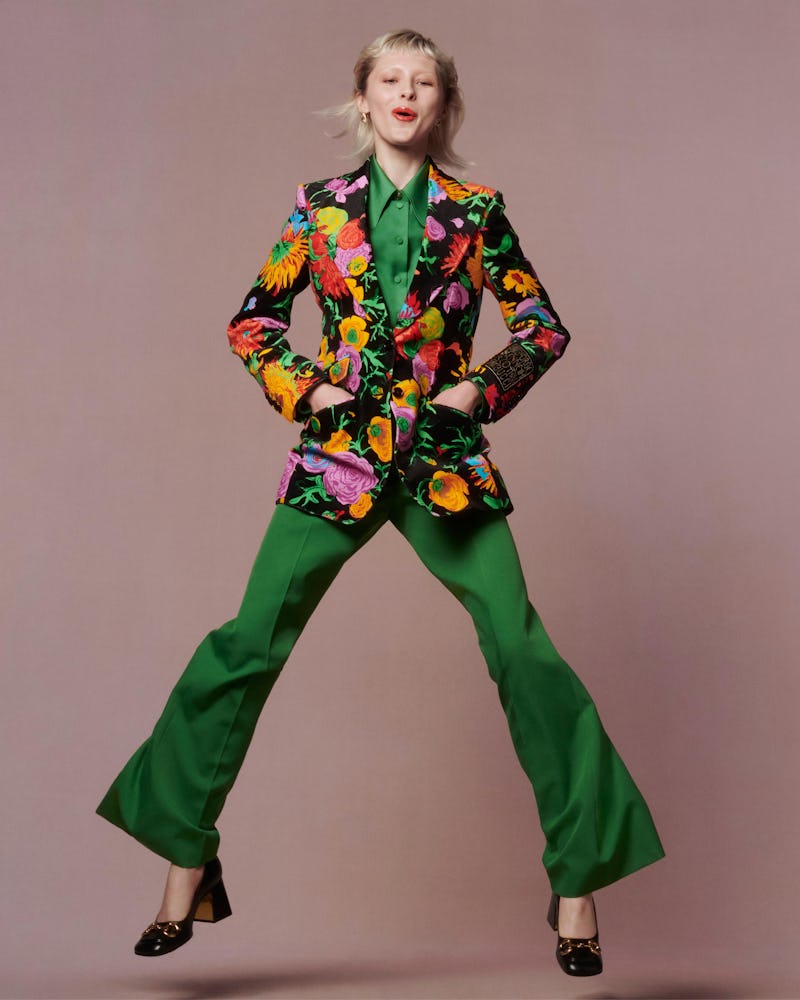 Model wearing a full Gucci green and floral look for Net-a-Porter's Spring/Summer 2021 'Ready To Wea...