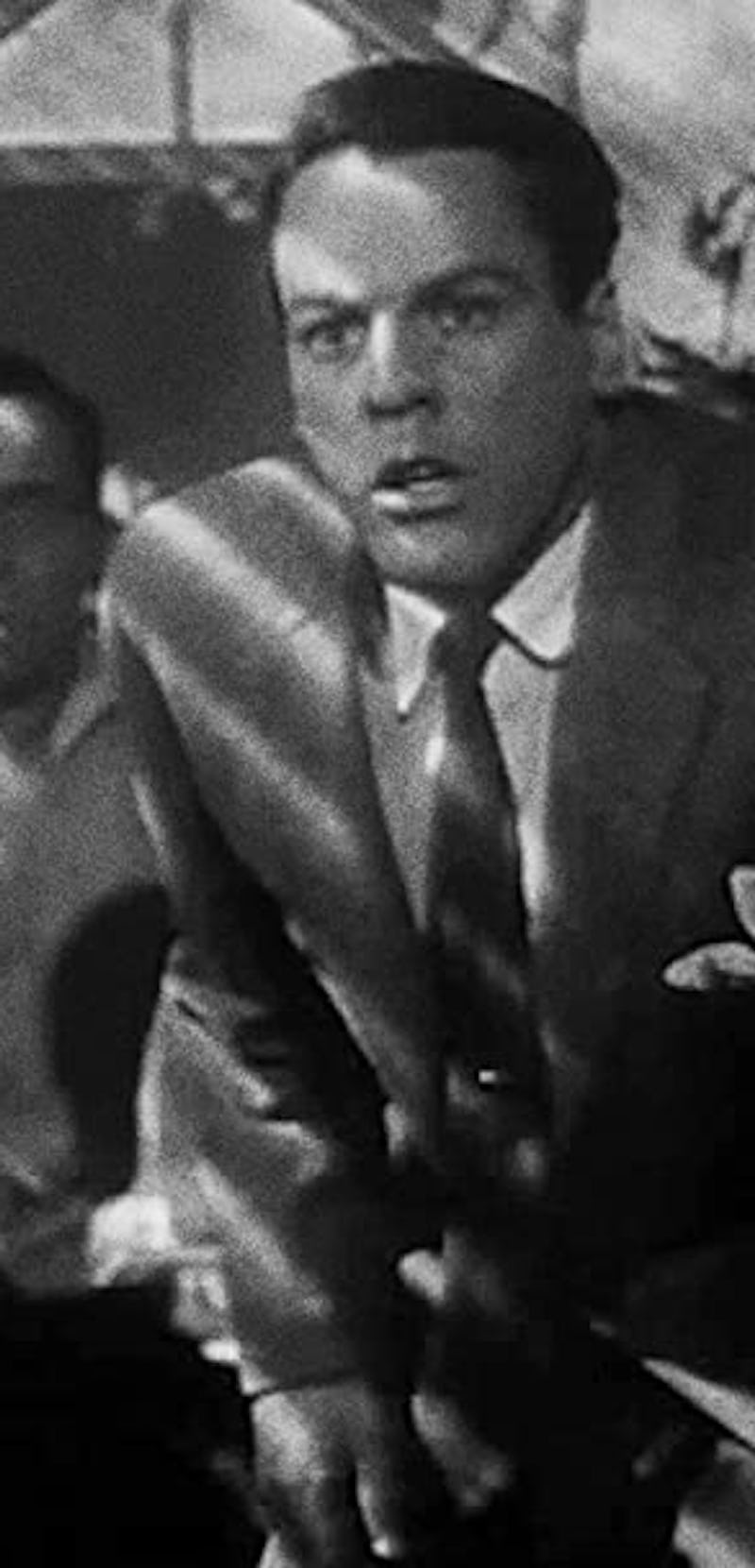 kevin mccarthy in greenhouse looking scared from invasion of the body snatchers