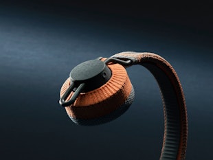 The Adidas fitness headphones in black and orange