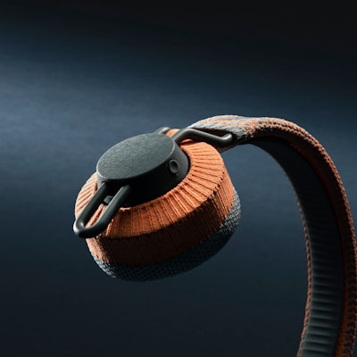 The Adidas fitness headphones in black and orange