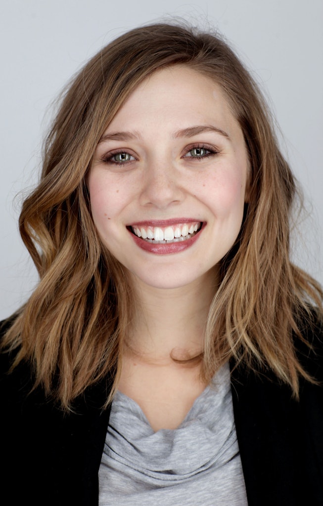 Elizabeth Olsen smiling in a photo for Sundance