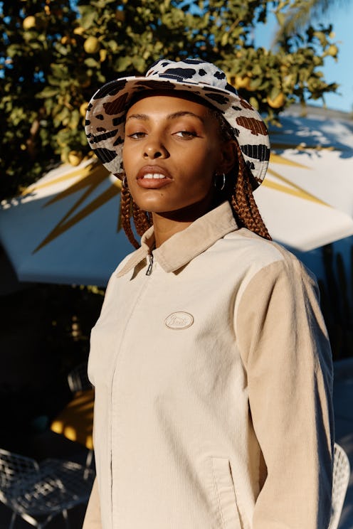 Model wears a bucket hat from Brixton's Packable Capsule.